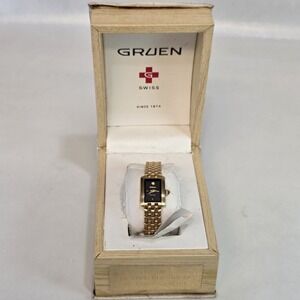 Ladies Casual GRUEN SWISS Watch Gold Tone Aase And Band With Black Dial GSL037‎